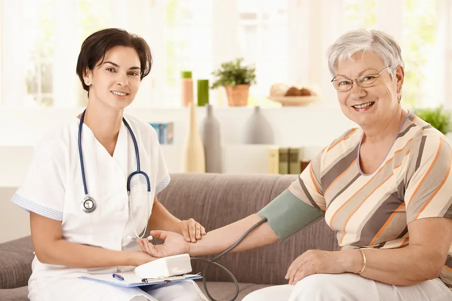A nurse with a patient at home